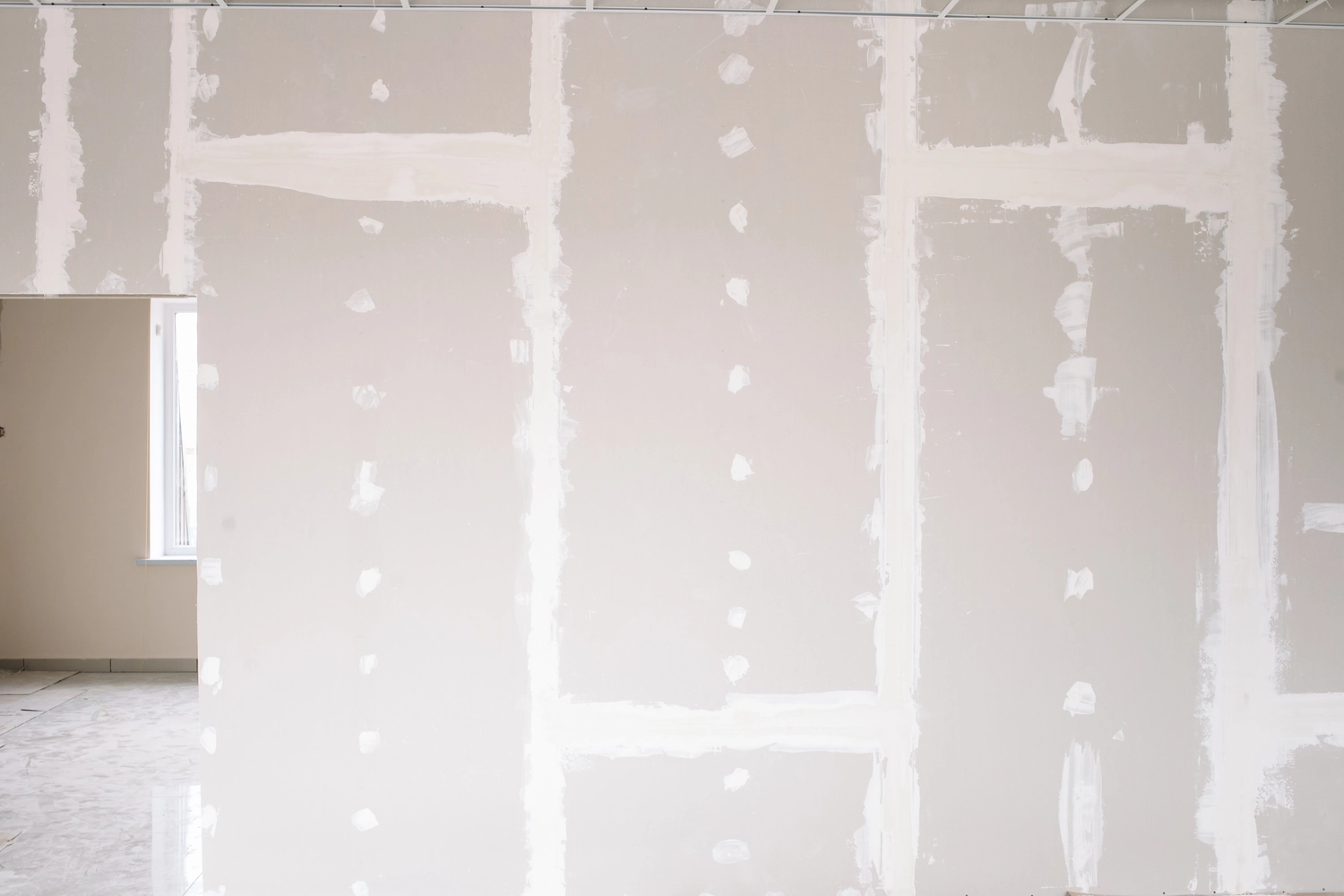 Karello Raumdesign - Innenausbau, Raumdesign und handwerkliche - Trockenbauwände für die Innenausstattung auf der Baustelle mit Platz für Text